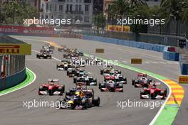 26.06.2011 Valencia, Spain,  Sebastian Vettel (GER), Red Bull Racing leads at the start of the race - Formula 1 World Championship, Rd 08, European Grand Prix, Sunday Race