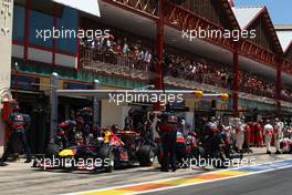 26.06.2011 Valencia, Spain,  Sebastian Vettel (GER), Red Bull Racing pit stop - Formula 1 World Championship, Rd 08, European Grand Prix, Sunday Race