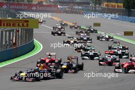 26.06.2011 Valencia, Spain,  Sebastian Vettel (GER), Red Bull Racing leads at the start of the race - Formula 1 World Championship, Rd 08, European Grand Prix, Sunday Race