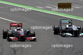 26.06.2011 Valencia, Spain,  Jenson Button (GBR), McLaren Mercedes leads Nico Rosberg (GER), Mercedes GP Petronas F1 Team - Formula 1 World Championship, Rd 08, European Grand Prix, Sunday Race