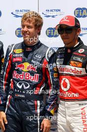 25.06.2011 Valencia, Spain,  Sebastian Vettel (GER), Red Bull Racing and Lewis Hamilton (GBR), McLaren Mercedes - Formula 1 World Championship, Rd 08, European Grand Prix, Saturday Qualifying