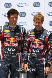 25.06.2011 Valencia, Spain,  Mark Webber (AUS), Red Bull Racing and Sebastian Vettel (GER), Red Bull Racing - Formula 1 World Championship, Rd 08, European Grand Prix, Saturday Qualifying