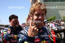 25.06.2011 Valencia, Spain,  Sebastian Vettel (GER), Red Bull Racing gets pole position with Mark Webber (AUS), Red Bull Racing in 2nd place - Formula 1 World Championship, Rd 08, European Grand Prix, Saturday Qualifying