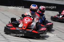 23.06.2011 Valencia, Spain,  Jenson Button (GBR), McLaren Mercedes and Pedro de la Rosa (GBR), test driver, McLaren Mercedes challenge young spanish sports star, karting - Formula 1 World Championship, Rd 08, European Grand Prix, Thursday