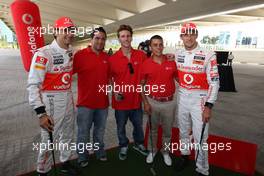 23.06.2011 Valencia, Spain,  Jenson Button (GBR), McLaren Mercedes and Pedro de la Rosa (GBR), test driver, McLaren Mercedes challenge young spanish sports star, at golf - Formula 1 World Championship, Rd 08, European Grand Prix, Thursday