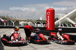 23.06.2011 Valencia, Spain,  Jenson Button (GBR), McLaren Mercedes and Pedro de la Rosa (GBR), test driver, McLaren Mercedes challenge young spanish sports star, karting - Formula 1 World Championship, Rd 08, European Grand Prix, Thursday