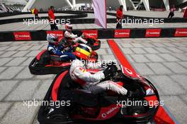 23.06.2011 Valencia, Spain,  Jenson Button (GBR), McLaren Mercedes and Pedro de la Rosa (GBR), test driver, McLaren Mercedes challenge young spanish sports star - Formula 1 World Championship, Rd 08, European Grand Prix, Thursday