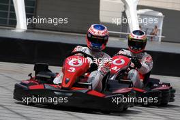 23.06.2011 Valencia, Spain,  Jenson Button (GBR), McLaren Mercedes and Pedro de la Rosa (GBR), test driver, McLaren Mercedes challenge young spanish sports star, karting - Formula 1 World Championship, Rd 08, European Grand Prix, Thursday