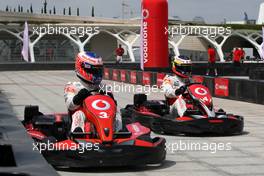 23.06.2011 Valencia, Spain,  Jenson Button (GBR), McLaren Mercedes and Pedro de la Rosa (GBR), test driver, McLaren Mercedes challenge young spanish sports star, karting - Formula 1 World Championship, Rd 08, European Grand Prix, Thursday