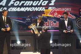 09.12.2011 New Dehli,India, FIA President Jean Todt presents FIA Formula One World Champion Sebastian Vettel with the winners trophy - 2011 FIA Prize Giving Gala