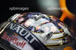 08.07.2011 Silverstone, UK, England,  Sebastian Vettel (GER), Red Bull Racing with a new helmet showing the faces of his mechanics - Formula 1 World Championship, Rd 09, British Grand Prix, Friday Practice