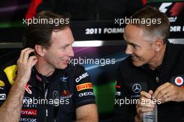 08.07.2011 Silverstone, UK, England,  Christian Horner (GBR), Red Bull Racing, Sporting Director, Martin Whitmarsh (GBR), McLaren, Chief Executive Officer, discussion over blown diffusers - Formula 1 World Championship, Rd 09, British Grand Prix, Friday Press Conference