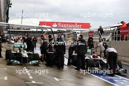 08.07.2011 Silverstone, UK, England,  Nico Rosberg (GER), Mercedes GP Petronas F1 Team, Michael Schumacher (GER), Mercedes GP Petronas F1 Team - Formula 1 World Championship, Rd 09, British Grand Prix, Friday Practice