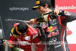 10.07.2011 Silverstone, UK, England,  Fernando Alonso (ESP), Scuderia Ferrari and Mark Webber (AUS), Red Bull Racing  - Formula 1 World Championship, Rd 09, British Grand Prix, Sunday Podium