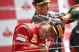 10.07.2011 Silverstone, UK, England,  1st place Fernando Alonso (ESP), Scuderia Ferrari and Mark Webber (AUS), Red Bull Racing  - Formula 1 World Championship, Rd 09, British Grand Prix, Sunday Podium