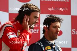 10.07.2011 Silverstone, UK, England,  1st place Fernando Alonso (ESP), Scuderia Ferrari with Mark Webber (AUS), Red Bull Racing - Formula 1 World Championship, Rd 09, British Grand Prix, Sunday Podium