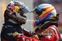 10.07.2011 Silverstone, UK, England,  Sebastian Vettel (GER), Red Bull Racing and Fernando Alonso (ESP), Scuderia Ferrari  - Formula 1 World Championship, Rd 09, British Grand Prix, Sunday Podium