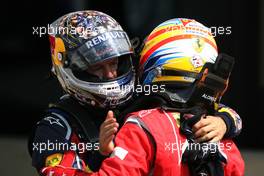 10.07.2011 Silverstone, UK, England,  Sebastian Vettel (GER), Red Bull Racing and Fernando Alonso (ESP), Scuderia Ferrari  - Formula 1 World Championship, Rd 09, British Grand Prix, Sunday Podium