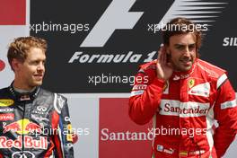 10.07.2011 Silverstone, UK, England,  Sebastian Vettel (GER), Red Bull Racing, Fernando Alonso (ESP), Scuderia Ferrari - Formula 1 World Championship, Rd 09, British Grand Prix, Sunday Podium