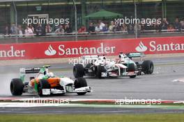 10.07.2011 Silverstone, UK, England,  Michael Schumacher (GER), Mercedes GP Petronas F1 Team crashes with Kamui Kobayashi (JAP), Sauber F1 Team  - Formula 1 World Championship, Rd 09, British Grand Prix, Sunday Race