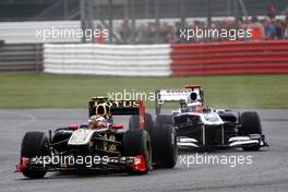 10.07.2011 Silverstone, UK, England,  Vitaly Petrov (RUS), Lotus Renault GP, Rubens Barrichello (BRA), AT&T Williams - Formula 1 World Championship, Rd 09, British Grand Prix, Sunday Race