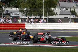 10.07.2011 Silverstone, UK, England,  Lewis Hamilton (GBR), McLaren Mercedes leads Sebastian Vettel (GER), Red Bull Racing - Formula 1 World Championship, Rd 09, British Grand Prix, Sunday Race