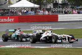 10.07.2011 Silverstone, UK, England,  Kamui Kobayashi (JAP), Sauber F1 Team leads Kamui Kobayashi (JAP), Sauber F1 Team, C30 - Formula 1 World Championship, Rd 09, British Grand Prix, Sunday Race