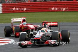 10.07.2011 Silverstone, UK, England,  Lewis Hamilton (GBR), McLaren Mercedes leads Fernando Alonso (ESP), Scuderia Ferrari - Formula 1 World Championship, Rd 09, British Grand Prix, Sunday Race