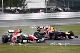 10.07.2011 Silverstone, UK, England,  Sebastian Vettel (GER), Red Bull Racing, Vitantonio Liuzzi (ITA), Hispania Racing Team, HRT - Formula 1 World Championship, Rd 09, British Grand Prix, Sunday Race