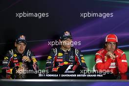 09.07.2011 Silverstone, UK, England,  Sebastian Vettel (GER), Red Bull Racing, Mark Webber (AUS), Red Bull Racing, Fernando Alonso (ESP), Scuderia Ferrari - Formula 1 World Championship, Rd 09, British Grand Prix, Saturday Press Conference