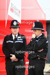 09.07.2011 Silverstone, UK, England,  Police in the paddock next to Ferrari - Formula 1 World Championship, Rd 09, British Grand Prix, Saturday Practice