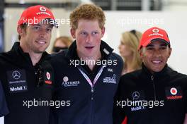 10.07.2011 Silverstone, UK, England,  Jenson Button (GBR), McLaren Mercedes, Prince Harry, Lewis Hamilton (GBR), McLaren Mercedes - Formula 1 World Championship, Rd 09, British Grand Prix, Sunday