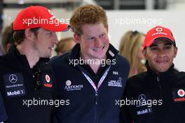 10.07.2011 Silverstone, UK, England,  Jenson Button (GBR), McLaren Mercedes, Prince Harry, Lewis Hamilton (GBR), McLaren Mercedes - Formula 1 World Championship, Rd 09, British Grand Prix, Sunday