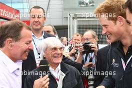 10.07.2011 Silverstone, UK, England,  Bernie Ecclestone (GBR) with Prince Harry - Formula 1 World Championship, Rd 09, British Grand Prix, Sunday