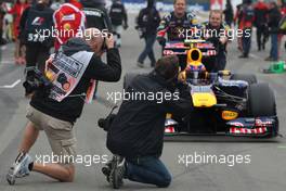 24.07.2011 Nurburgring, Germany,  Photographers, Mark Webber (AUS), Red Bull Racing  - Formula 1 World Championship, Rd 10, German Grand Prix, Sunday Pre-Race Grid