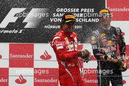 24.07.2011 Nurburgring, Germany,  Fernando Alonso (ESP), Scuderia Ferrari and Mark Webber (AUS), Red Bull Racing  - Formula 1 World Championship, Rd 10, German Grand Prix, Sunday Podium