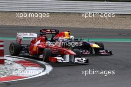 24.07.2011 Nurburgring, Germany,  Fernando Alonso (ESP), Scuderia Ferrari and Sebastian Vettel (GER), Red Bull Racing  - Formula 1 World Championship, Rd 10, German Grand Prix, Sunday Race