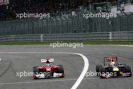 24.07.2011 Nurburgring, Germany, Fernando Alonso (ESP), Scuderia Ferrari and Sebastian Vettel (GER), Red Bull Racing  - Formula 1 World Championship, Rd 10, German Grand Prix, Sunday Race