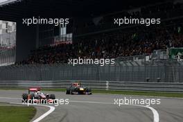 24.07.2011 Nurburgring, Germany, Lewis Hamilton (GBR), McLaren Mercedes  and Mark Webber (AUS), Red Bull Racing  - Formula 1 World Championship, Rd 10, German Grand Prix, Sunday Race