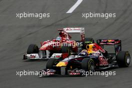 24.07.2011 Nurburgring, Germany, Mark Webber (AUS), Red Bull Racing and Fernando Alonso (ESP), Scuderia Ferrari  - Formula 1 World Championship, Rd 10, German Grand Prix, Sunday Race