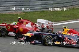 24.07.2011 Nurburgring, Germany, Felipe Massa (BRA), Scuderia Ferrari and Mark Webber (AUS), Red Bull Racing  - Formula 1 World Championship, Rd 10, German Grand Prix, Sunday Race