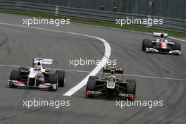 24.07.2011 Nurburgring, Germany, Sergio Perez (MEX), Sauber F1 Team and Vitaly Petrov (RUS), Lotus Renalut F1 Team  - Formula 1 World Championship, Rd 10, German Grand Prix, Sunday Race