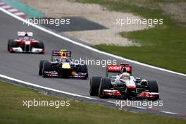 24.07.2011 Nurburgring, Germany,  Lewis Hamilton (GBR), McLaren Mercedes leads Mark Webber (AUS), Red Bull Racing - Formula 1 World Championship, Rd 10, German Grand Prix, Sunday Race