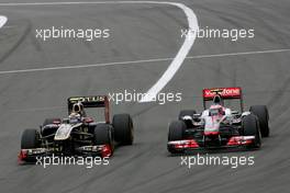 24.07.2011 Nurburgring, Germany, Vitaly Petrov (RUS), Lotus Renalut F1 Team and Jenson Button (GBR), McLaren Mercedes  - Formula 1 World Championship, Rd 10, German Grand Prix, Sunday Race