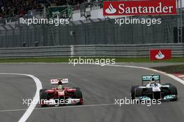 24.07.2011 Nurburgring, Germany, Felipe Massa (BRA), Scuderia Ferrari and Nico Rosberg (GER), Mercedes GP  - Formula 1 World Championship, Rd 10, German Grand Prix, Sunday Race