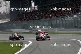 24.07.2011 Nurburgring, Germany, Mark Webber (AUS), Red Bull Racing, Lewis Hamilton (GBR), McLaren Mercedes and Fernando Alonso (ESP), Scuderia Ferrari  - Formula 1 World Championship, Rd 10, German Grand Prix, Sunday Race