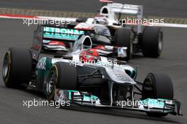 24.07.2011 Nurburgring, Germany,  Michael Schumacher (GER), Mercedes GP Petronas F1 Team leads Kamui Kobayashi (JAP), Sauber F1 Team - Formula 1 World Championship, Rd 10, German Grand Prix, Sunday Race