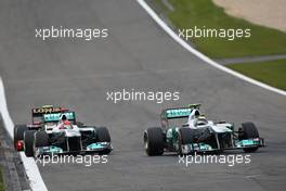 24.07.2011 Nurburgring, Germany,  Nico Rosberg (GER), Mercedes GP Petronas F1 Team leads Michael Schumacher (GER), Mercedes GP Petronas F1 Team - Formula 1 World Championship, Rd 10, German Grand Prix, Sunday Race