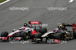 24.07.2011 Nurburgring, Germany, Jenson Button (GBR), McLaren Mercedes and Vitaly Petrov (RUS), Lotus Renalut F1 Team  - Formula 1 World Championship, Rd 10, German Grand Prix, Sunday Race