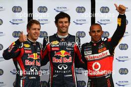 23.07.2011 Nurburgring, Germany,  Mark Webber (AUS), Red Bull Racing gets pole position, Sebastian Vettel (GER), Red Bull Racing 3rd and Lewis Hamilton (GBR), McLaren Mercedes 2nd - Formula 1 World Championship, Rd 10, German Grand Prix, Saturday Qualifying